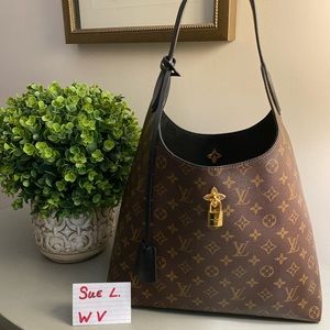 Authentic Flower Hobo bag by Louis Vuitton